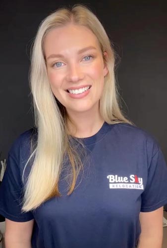 Blue Sky Relocation customer service team member in branded uniform